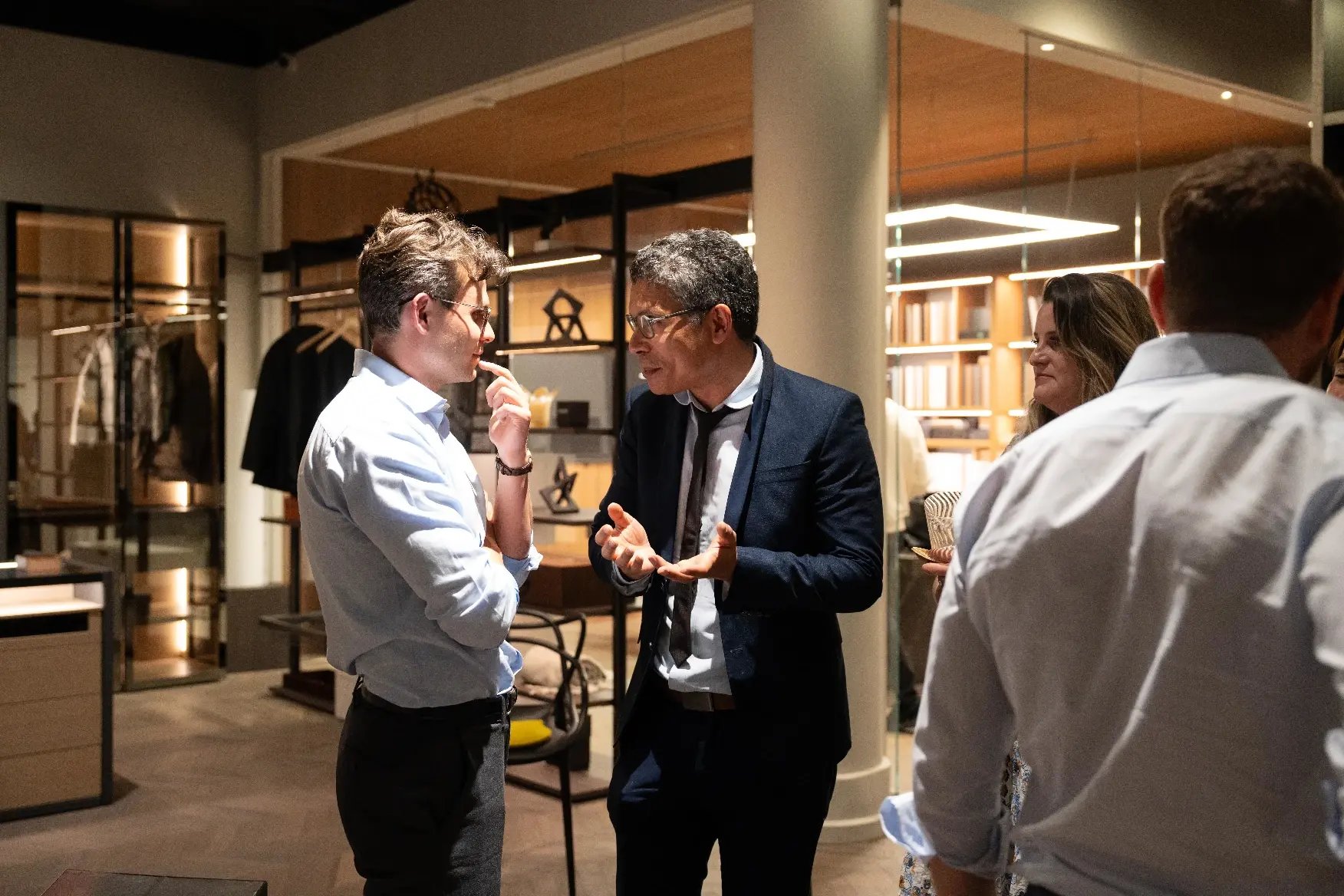 Event attendees chatting at ITALKRAFT's New York showroom
